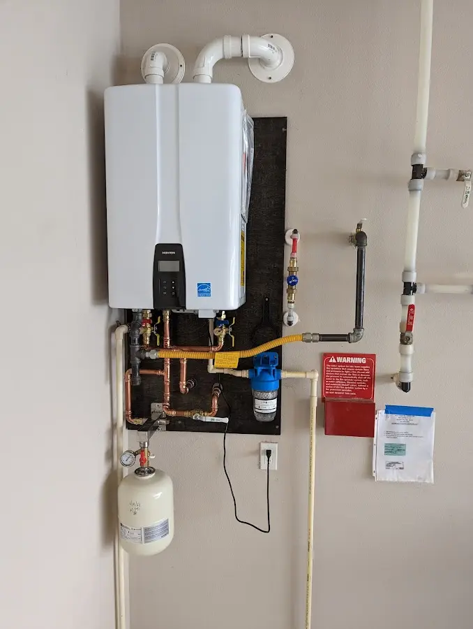 Professional plumber installing copper piping in a View Park-Windsor Hills home